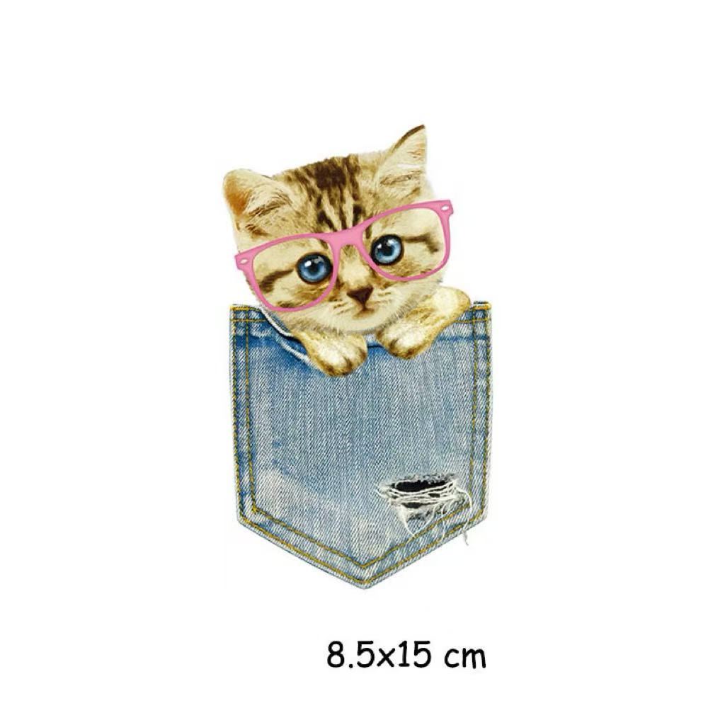 Set of pocket cat iron-on patches laid flat showing all designs